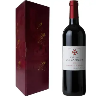 Bouteille Ch. des Capucins Lalande de Pomerol dans coffret rubis